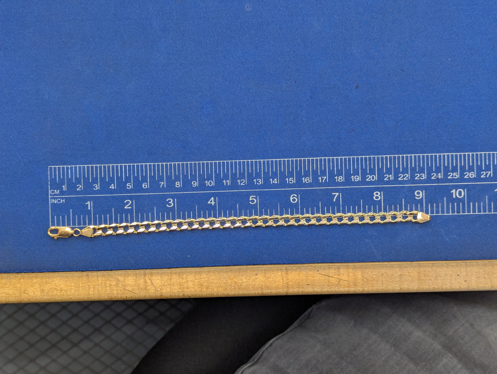 Pulsera de eslabones biselados de oro amarillo de 14 quilates