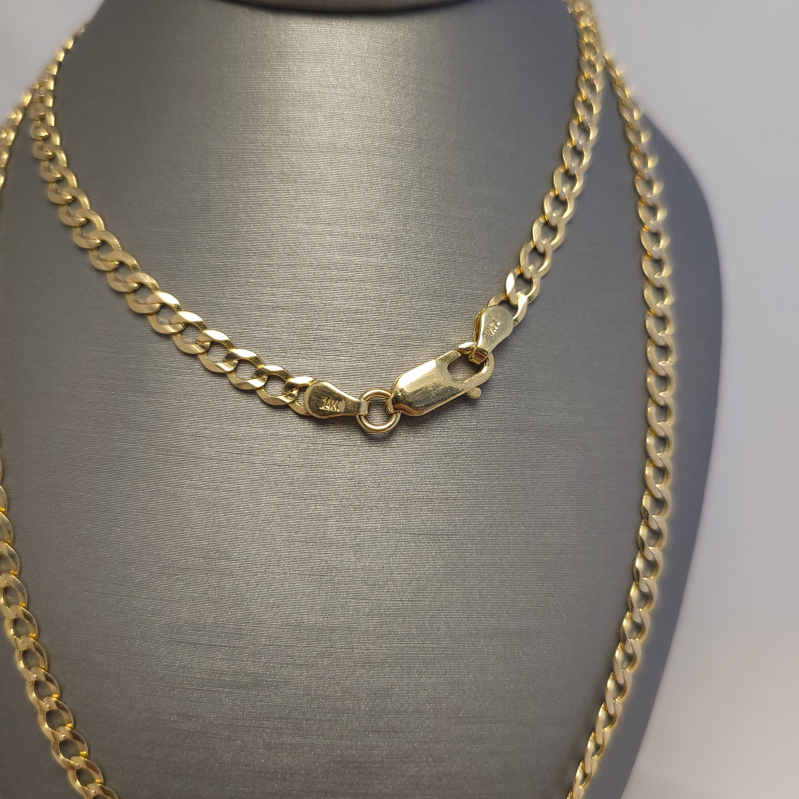 Cadena maciza de eslabones tipo "Curb" de oro amarillo de 14K