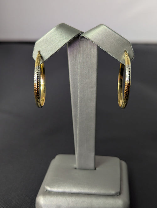 Pendientes de aro huecos de oro tricolor de 14K con corte de diamante