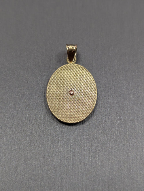 Dije de oro bicolor de 14 quilates con corte diamante de la Virgen de Guadalupe