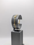 Pulsera Figaro de oro amarillo de 14K con dije de la buena suerte