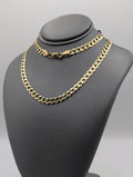 Cadena de eslabones tipo barbada de oro amarillo de 14K