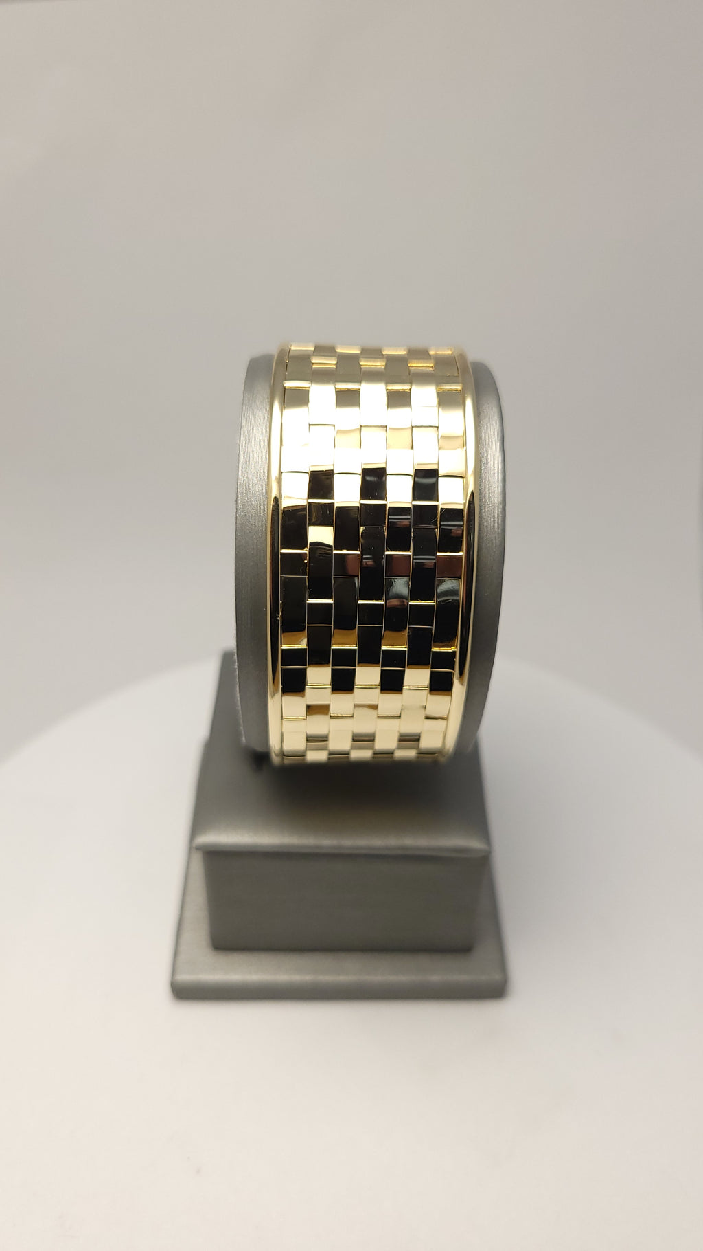 Brazalete tejido de oro amarillo de 14 quilates