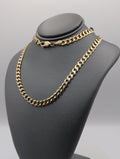 Cadena de eslabones tipo barbada de oro amarillo de 14K
