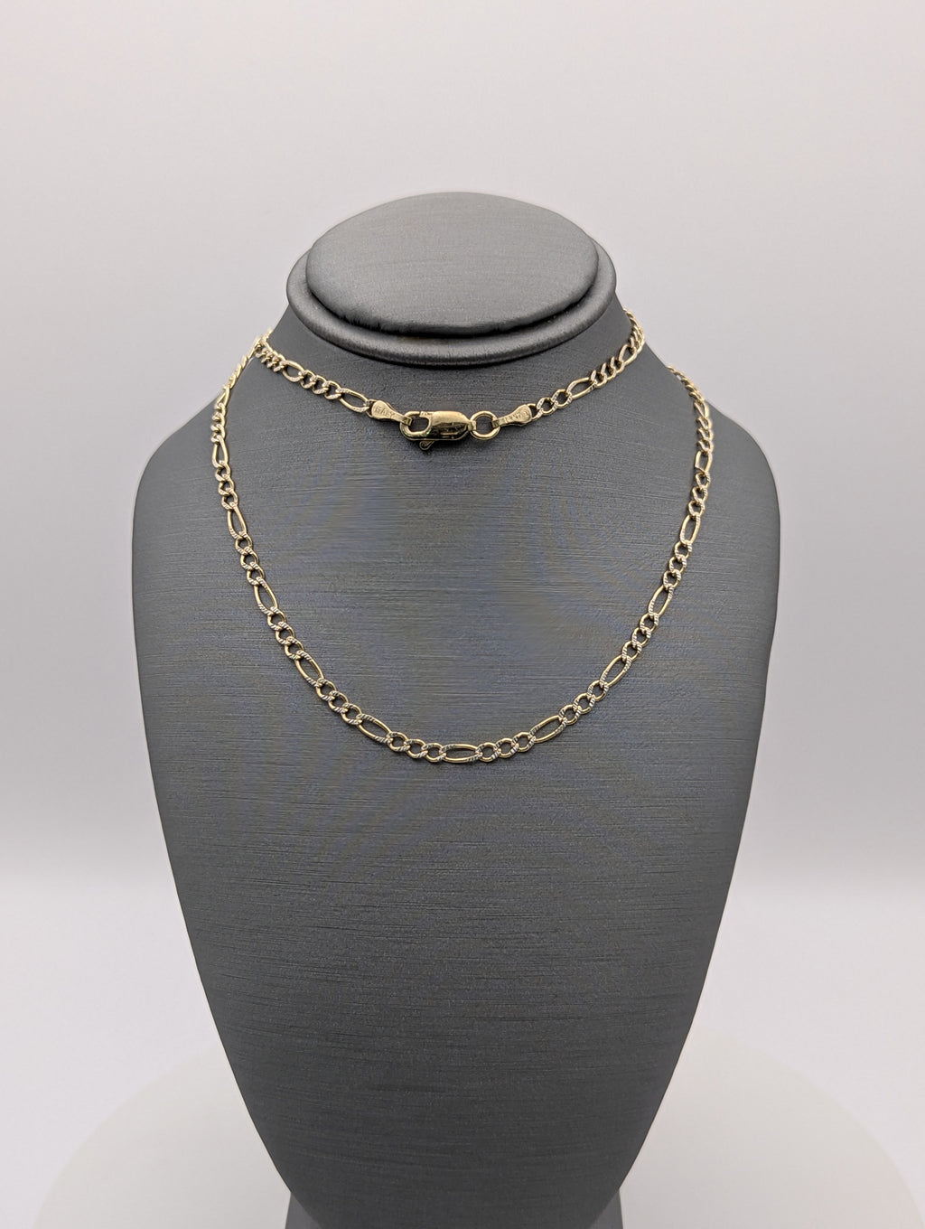 Cadena Fígaro de oro amarillo de 14K con corte de diamante