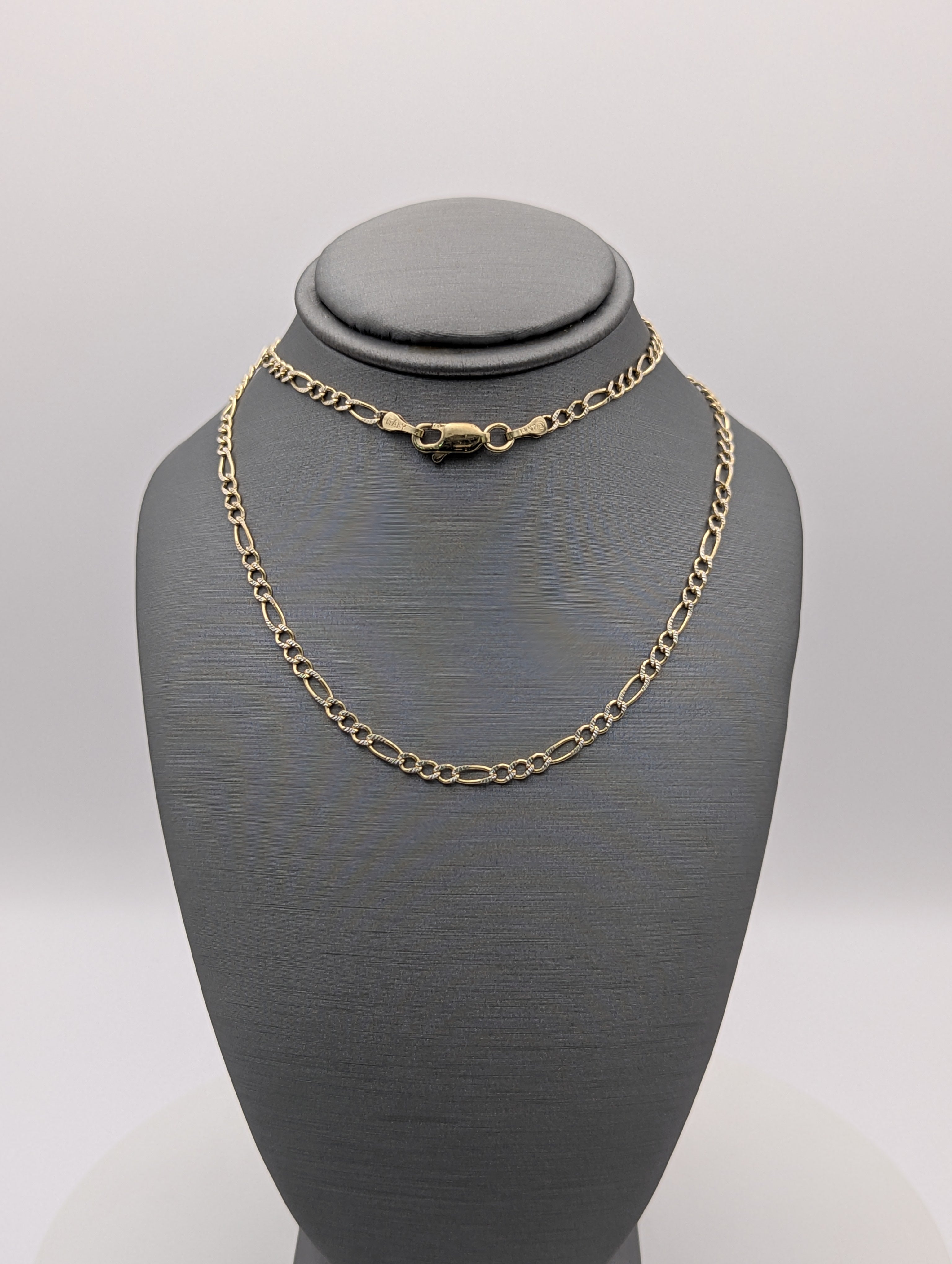 Cadena Fígaro de oro amarillo de 14K con corte de diamante
