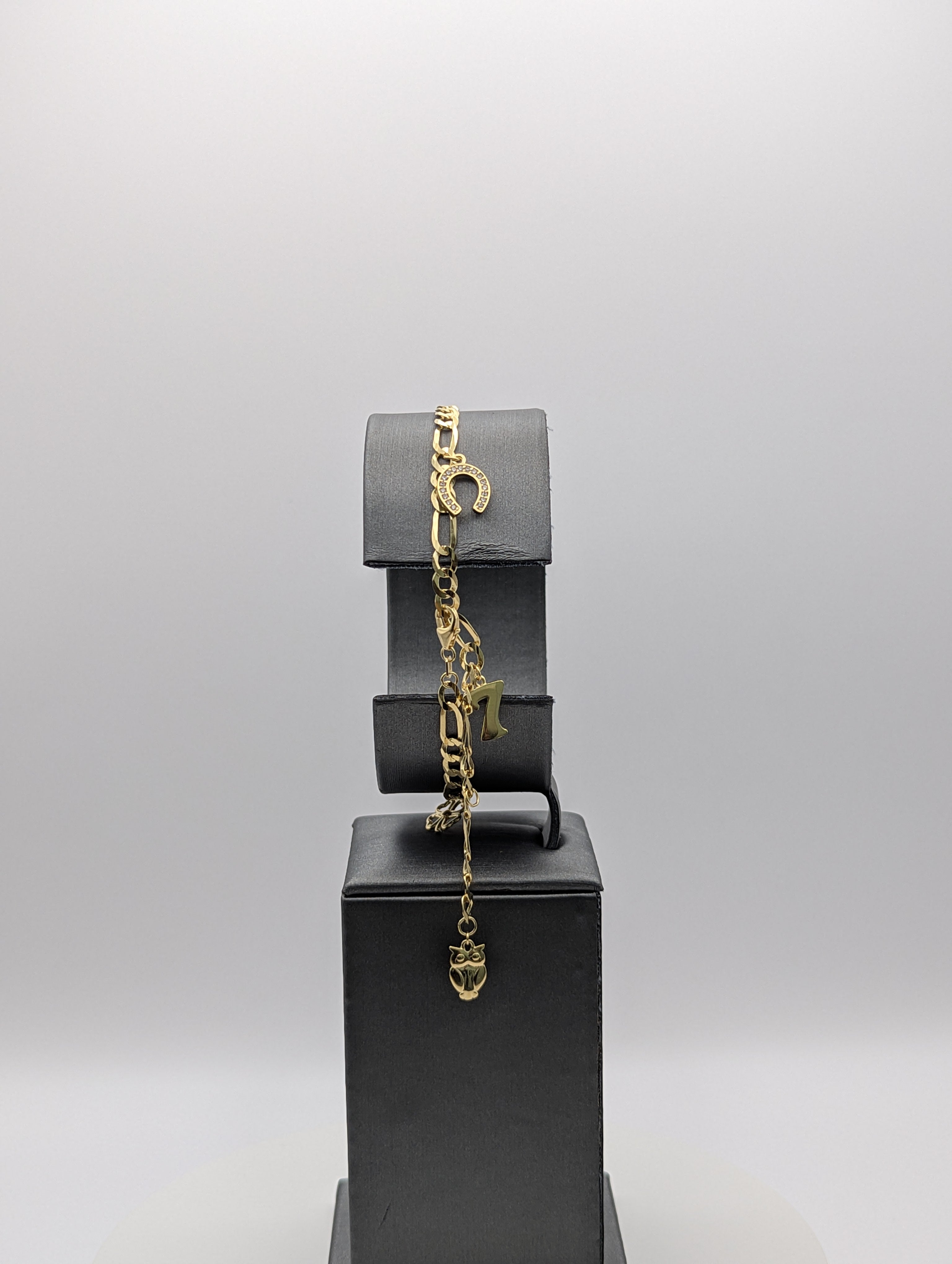 14K YG Figaro Lucky Charm Bracelet