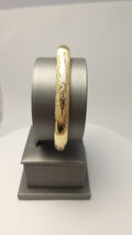 Pulsera texturizada de oro amarillo de 14 quilates