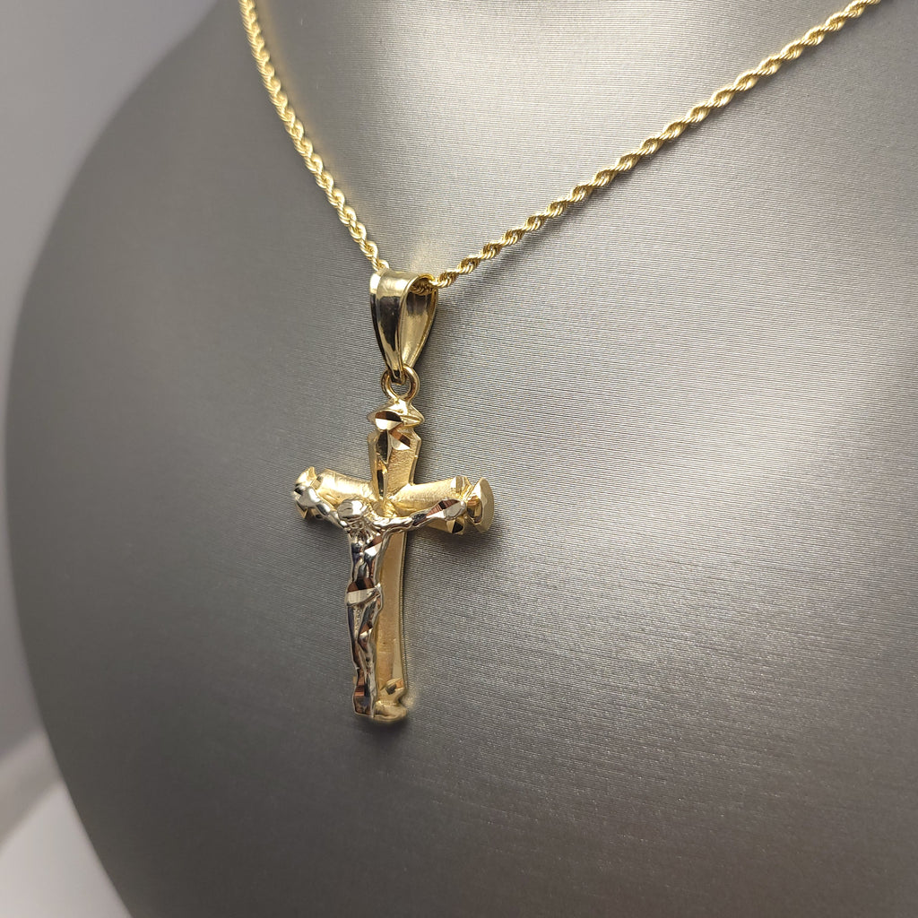 Colgante con crucifijo bicolor de oro de 14 quilates