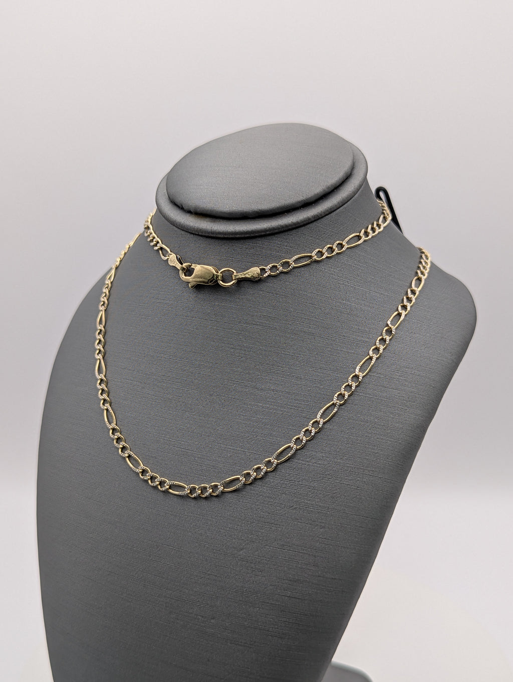 Cadena Fígaro de oro amarillo de 14K con corte de diamante