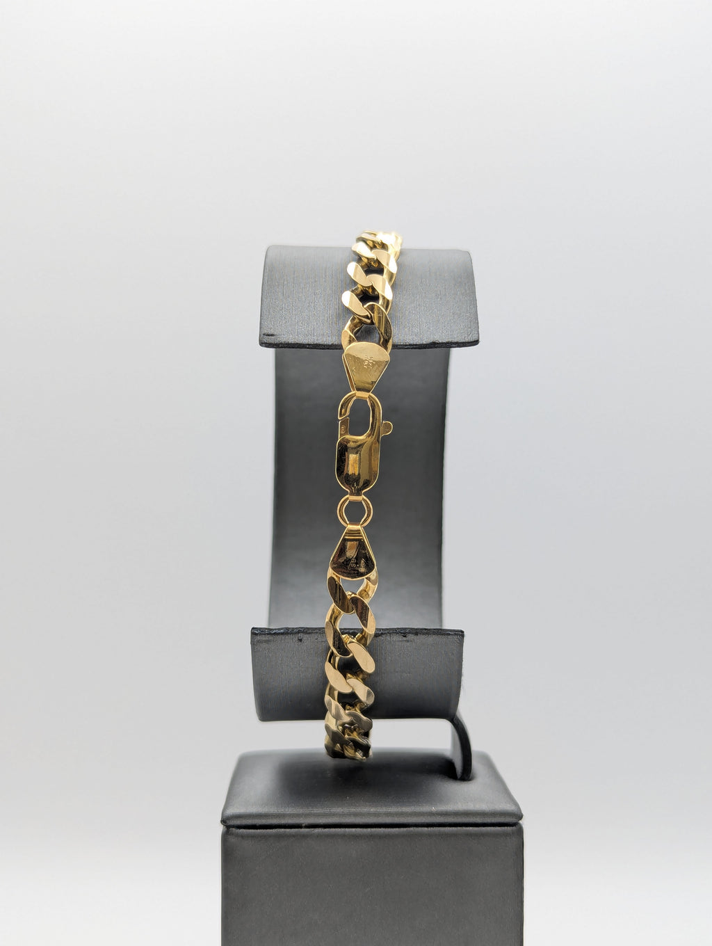 Pulsera de eslabones biselados de oro amarillo de 14 quilates