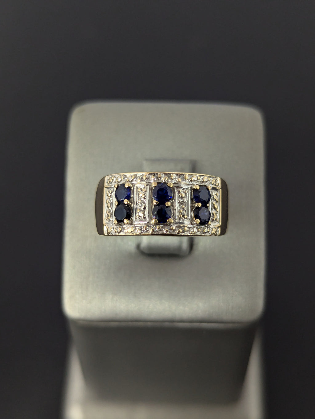 Anillo bicolor de oro de 14 quilates con circonita cúbica azul
