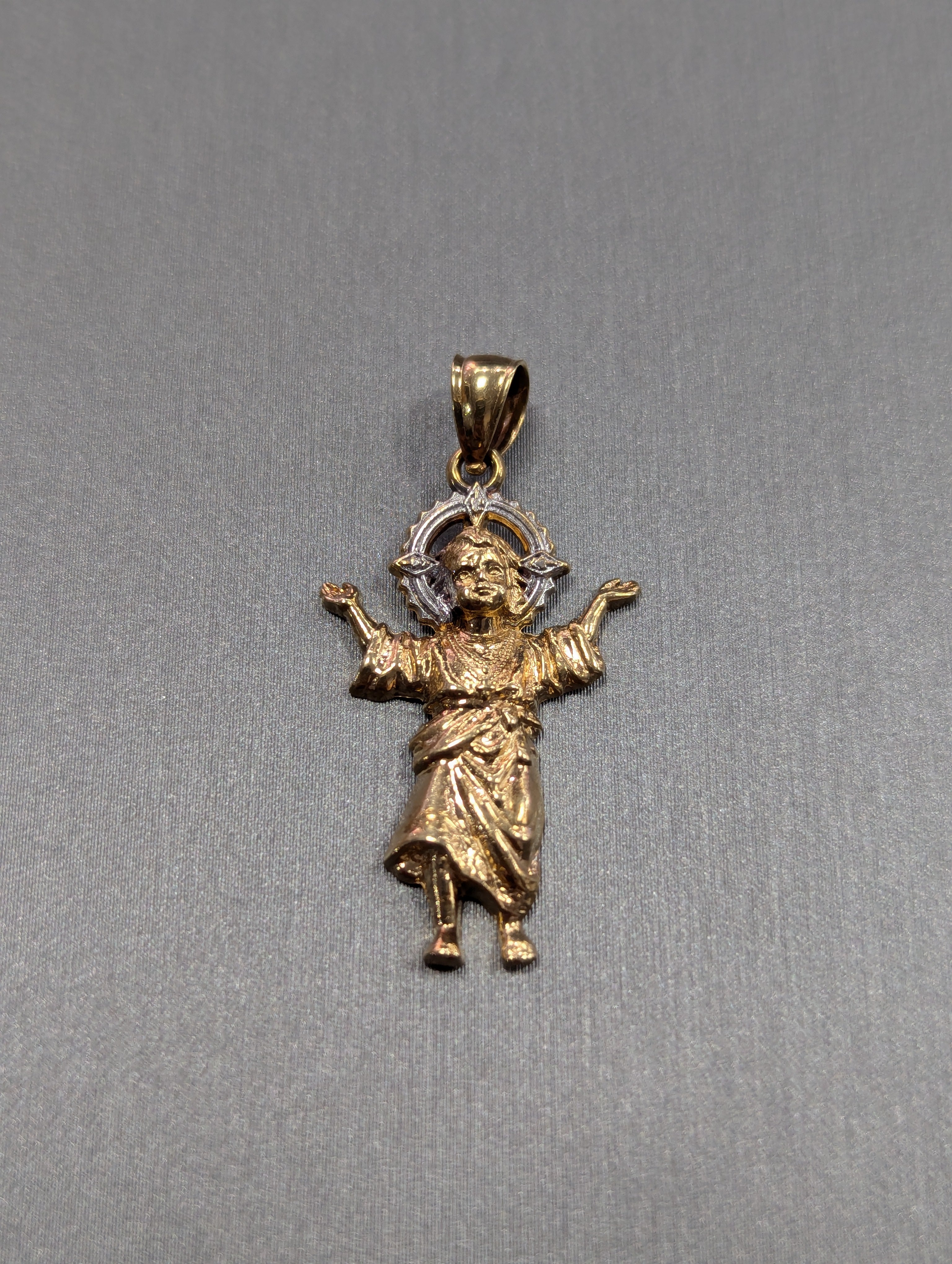 Colgante Divino Niño bicolor de 14K