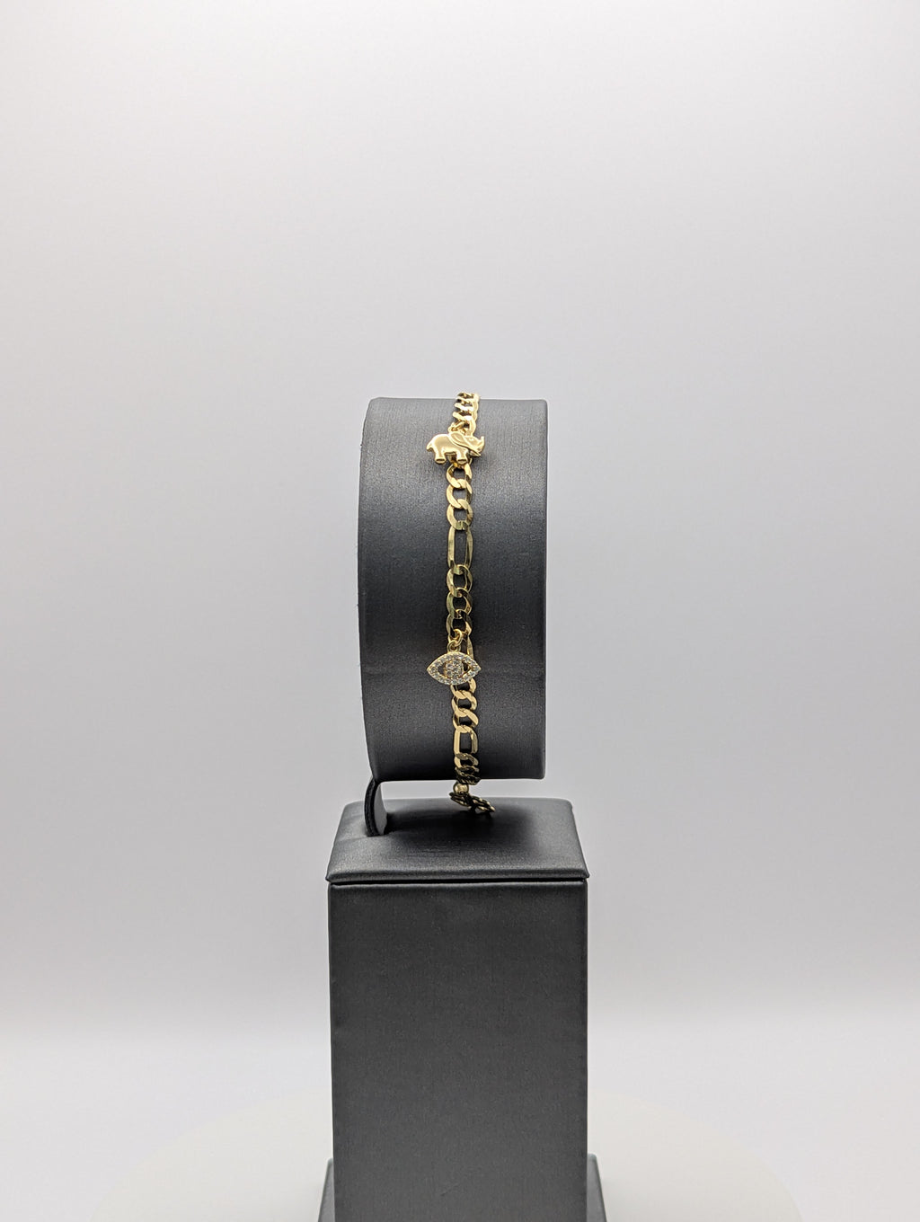 Pulsera Figaro de oro amarillo de 14K con dije de la buena suerte