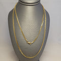 Cadena maciza barbada de oro amarillo de 14K