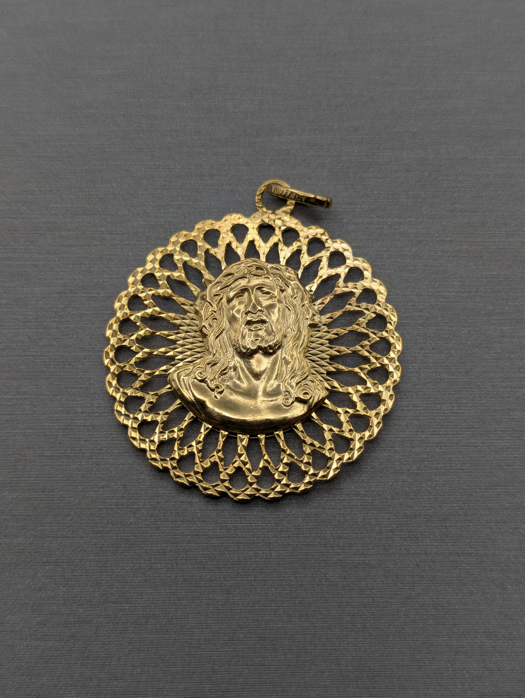 Dije/Colgante de 14K en oro amarillo con la cabeza de Jesús/María