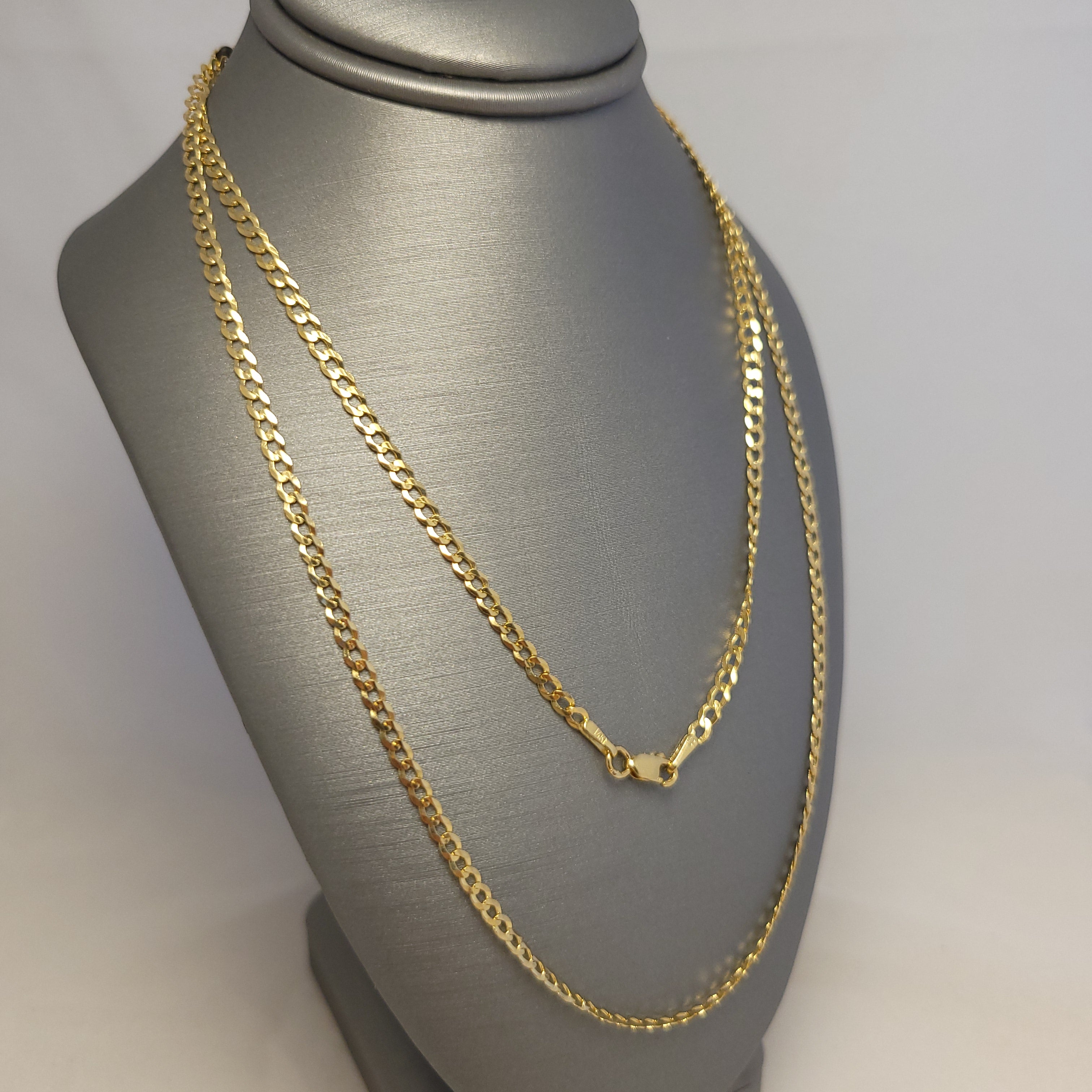 Cadena maciza barbada de oro amarillo de 14K