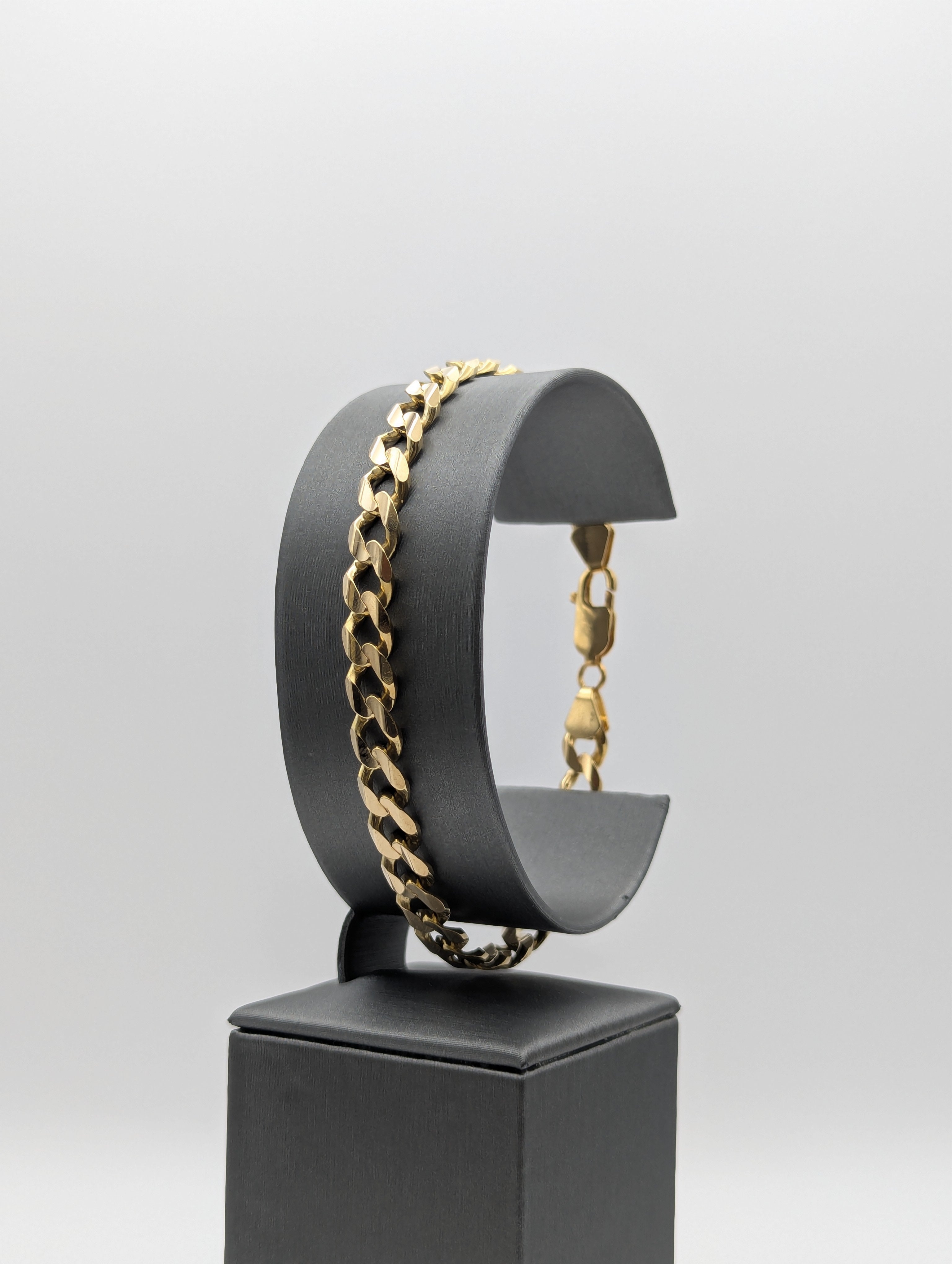 Pulsera de eslabones biselados de oro amarillo de 14 quilates